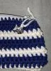 Crocheted change purse different. Colours striped
