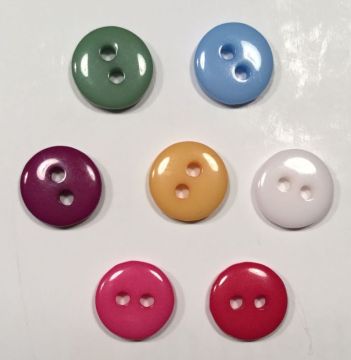 Botón de plástico pequeño y colorido