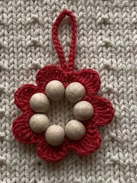 Taschenbaumler aus rotem Bändchengarn